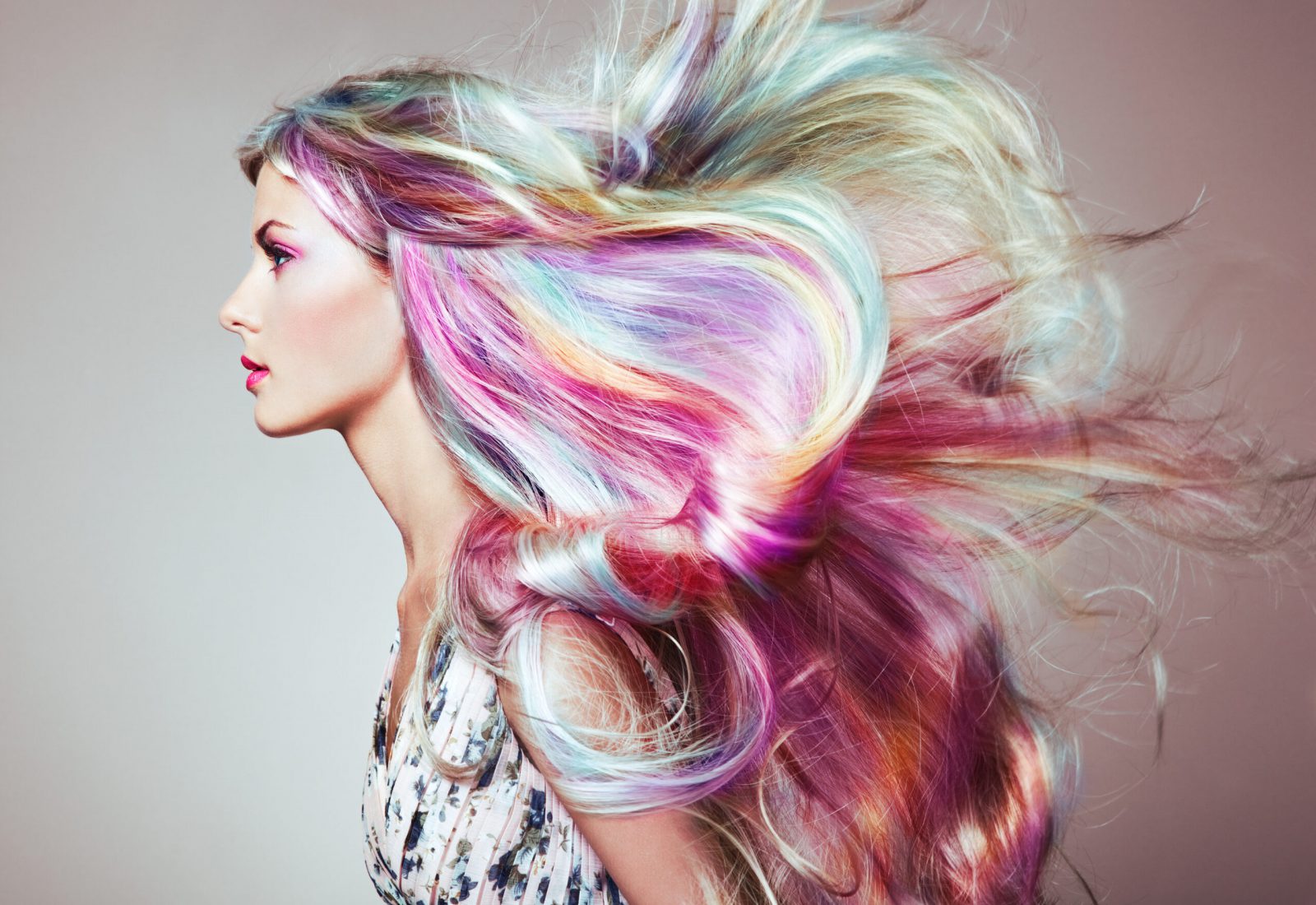 Beauty Fashion Model Girl with Colorful Dyed Hair. Girl with perfect Makeup and Hairstyle. Model with perfect Healthy Dyed Hair. Rainbow Hairstyles